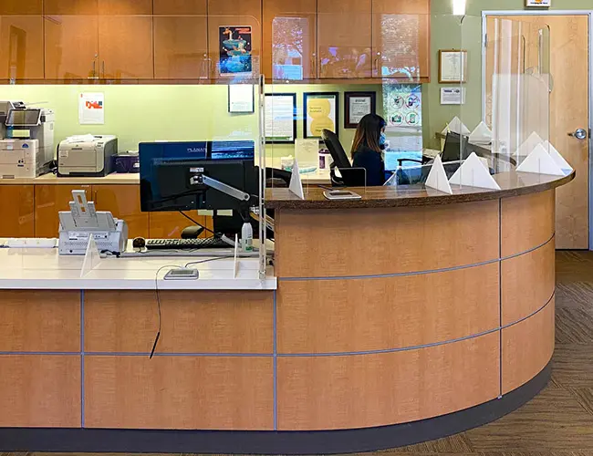 Patients with masks, gloves and hand sanitization at London Square Dental Calgary