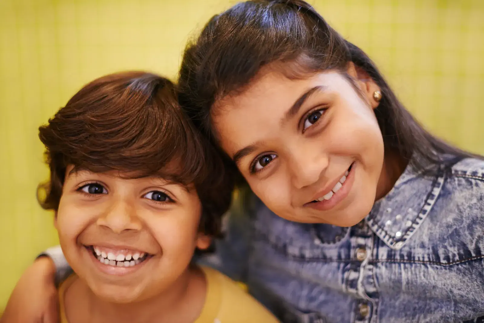 Children with healthy smiles after preventive dental care